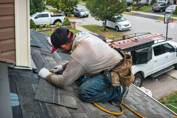 Professional Roofing technician working in Gilford, NH